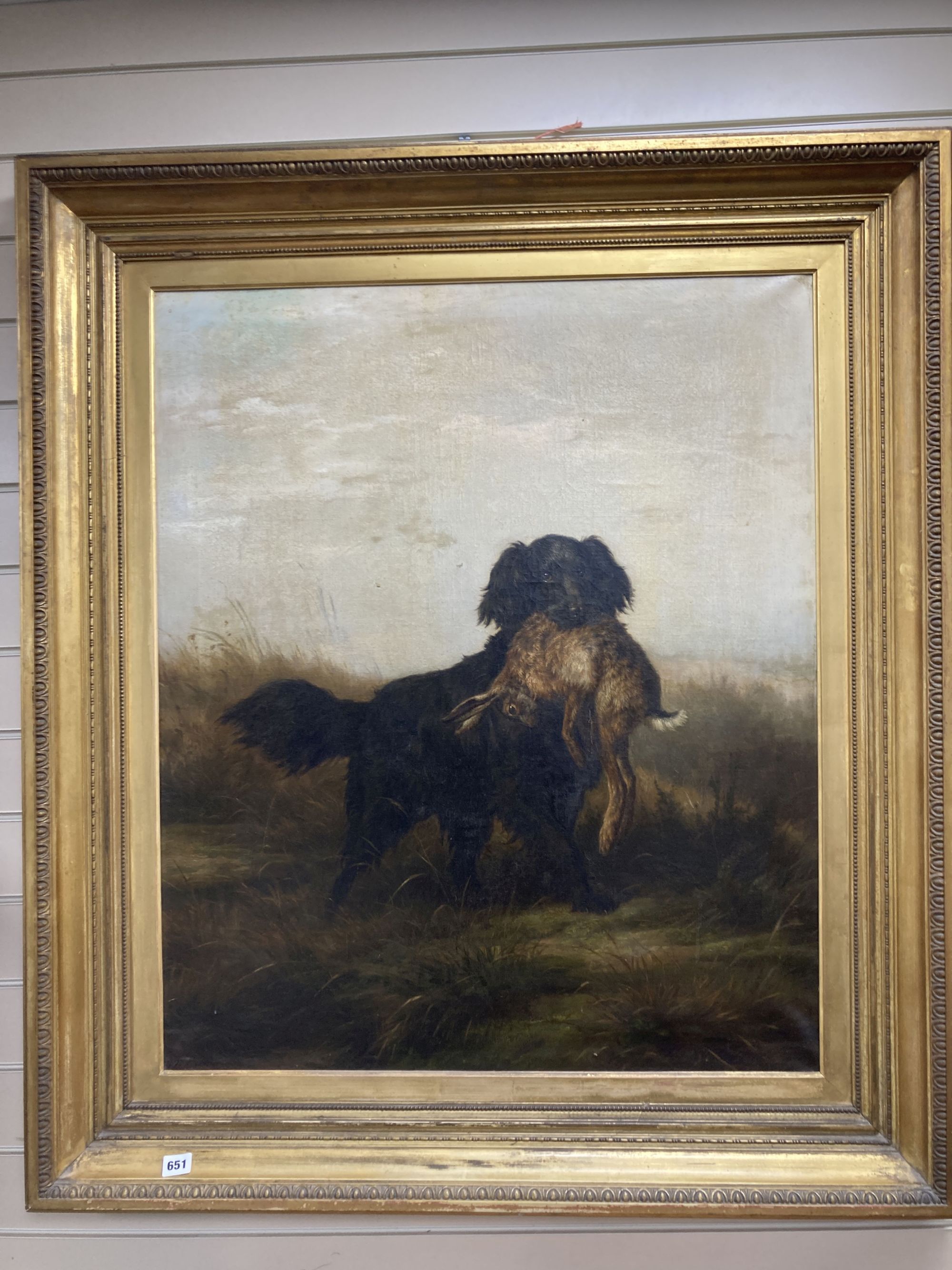 J. Detker (19th C.), oil on canvas, Black retriever with a hare, signed and dated 1879, 92 x 76cm